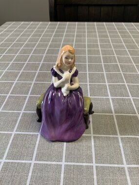 Royal Doulton Figurine of Young Woman in Purple Dress